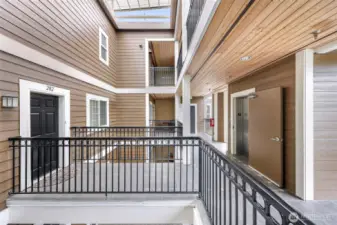 Main entry leads directly to elevator & stairs