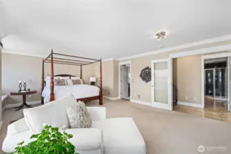 Another view of the primary bedroom suite.