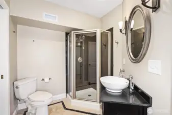 3/4 bath off lower level primary bedroom suite.