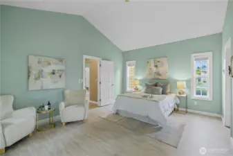 Vaulted ceilings in the primary bedroom.