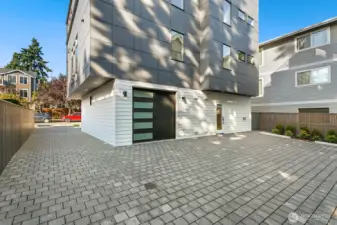 2035B has a garage which is accessed from the courtyard area.