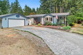 Front of house with detached garage