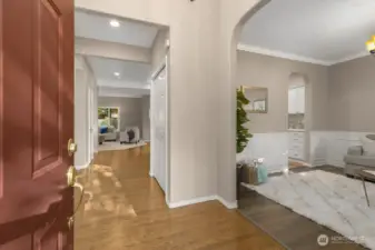 Step inside to a bright foyer with hardwood floors and classic millwork.