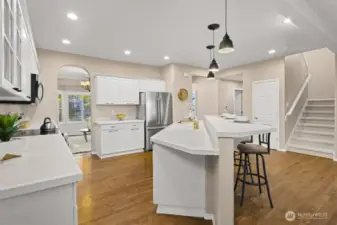 Extra storage and a large center island with seating make meal prep and entertaining easy.