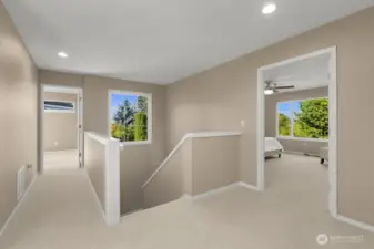 Upstairs you’ll find the primary suite along with three additional bedrooms.