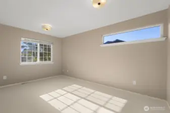 Versatile upstairs bedroom ideal for guests, office, or playroom.
