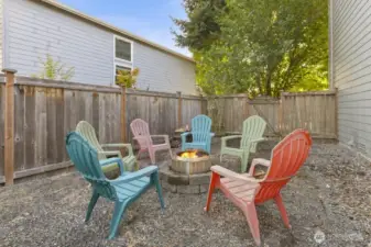 Outdoor fire pit area perfect for year-round entertaining.