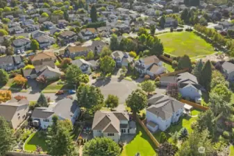 Aerial view highlighting the cul-de-sac setting and proximity to the neighborhood park.