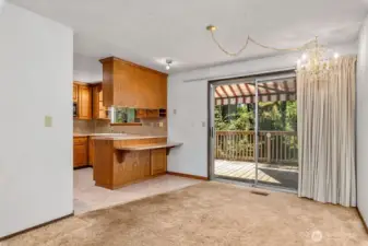 Dinning Room with deck access off of the large kitchen