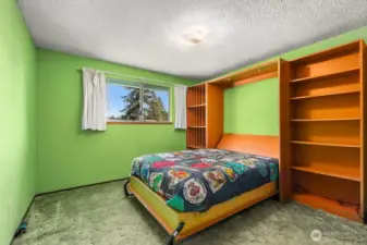 Large second bedroom (Murphy Bed shown) and additional large closet.