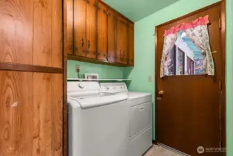 Laundry room with large pantry and deck access