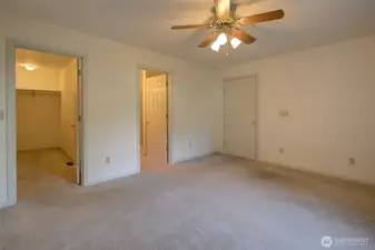 Looking into the closet and bathroom.