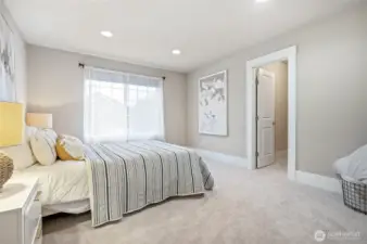 Secondary bedroom with walk-in closet