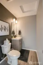 half bath off of the family room/entry hall area