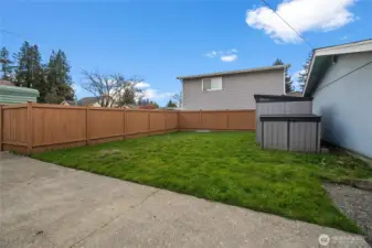 Large lawn with storage sheds
