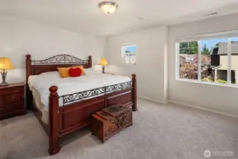 Primary bedroom with fresh paint and new carpet