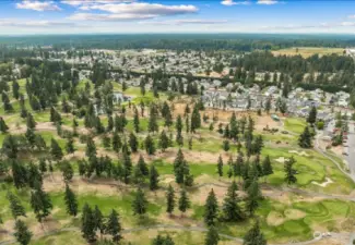 Arial views of the Classics Enclave community overlooking the golf course 8.20.24.