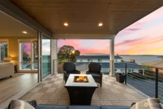 Covered deck with expansive views of Puget Sound