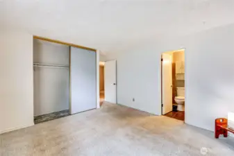 Another view of the spacious primary bedroom with it own 3/4 bath.