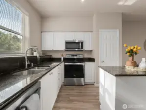 Large kitchen island and updated counters and appliances
