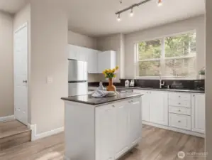 Large kitchen island and updated counters and appliances
