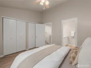 Primary bedroom vaulted ceilings and private suite