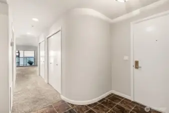 Just inside the front door you'll find lots of  storage on your way to the main living areas  with incredible views of the waterfront.