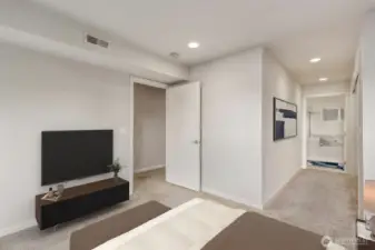 Large primary bedroom with attached full  bathroom.