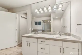 Primary 5 pc. bathroom with double sinks,  soaking tub & full tile walk-in shower.