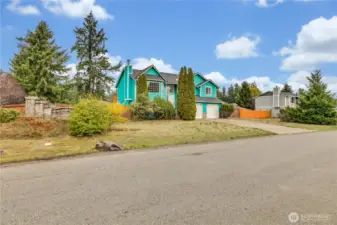 Corner lot.  2 car attached garage, plenty of parking on driveway,