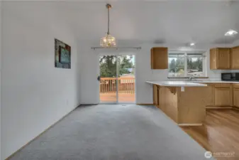 Formal dining room next to kitchen.
