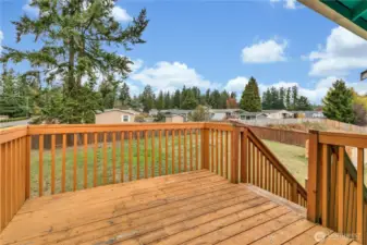 Sun deck with direct access to the huge backyard.