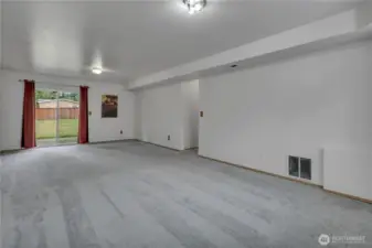 Very large recreational room with access to patio/backyard