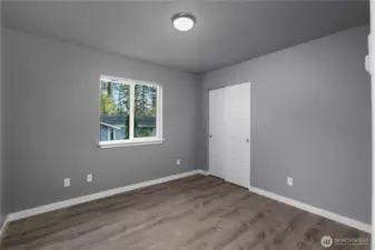 Bedroom 3 faces the side of the home.