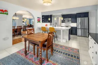 Eat in kitchen with bar seating curates room to gather and enjoy company