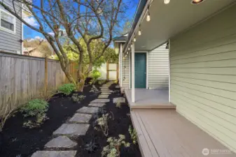 Covered walkway leads to garage