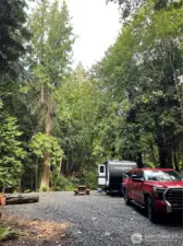 Large level pad for camping or potential homesite.