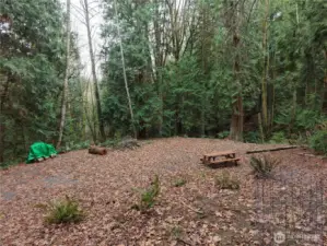 Large level pad for camping or potential homesite.