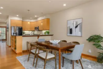 The dining area is adjacent to the kitchen.