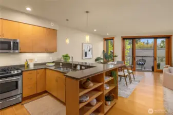 Enjoy the open kitchen with abundant storage and prep space. Stainless appliances.