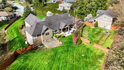 Expansive Lush Lawn~Sprinkler System~Professionally Landscaped & Maintained~Smells of Summer & Fresh Cut Grass~Home & Garage DADU are Each Served by their Own Septic Systems~