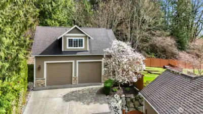 Detached Garage Measures 836 sq ft & Includes a MIL Apartment Above @ 668 sq ft. Automatic Doors~Double Bay~30 ft Wide~26 ft Deep~Bump out on the South Side for the Stairs to the Upper Level & the "Man" Door~