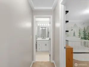 Hall leading to bedrooms and full bathroom