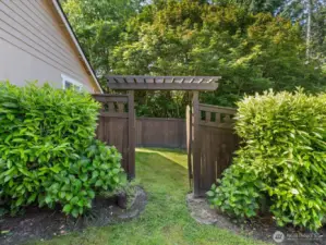 Right side of the house leading to private back yard
