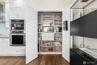 So much storage with the cabinets and pantry. Even enhanced shelving in the pantry including drawers