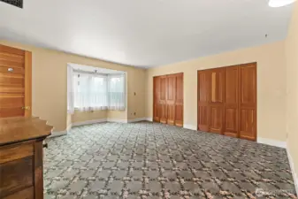 Bedroom 1 with half bath and garden window
