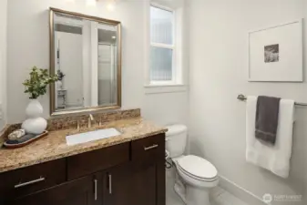 bathroom with shower on the main floor.
