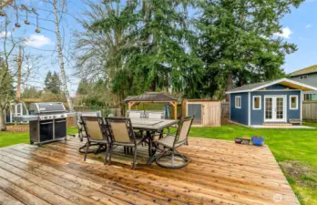 Backyard Deck with view of hot tub and WFH Shed