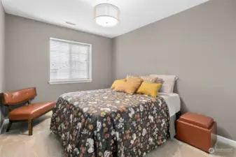 All three bedrooms have Anderson Tuftex carpeting, paired with an 8lb. memory foam carpet pad boasting an antimicrobial moisture barrier, ensuring both comfort and cleanliness.