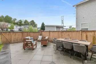 Enjoy privacy and outdoor living at its best with a fenced backyard featuring a spacious 600 sq ft patio, perfect for entertaining guests or relaxing on your own.